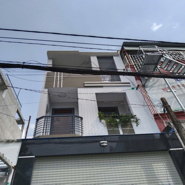 NHÀ MỚI MẶT TIỀN NGUYỄN HỮU DẬT, 4x16m, HẺM XE HƠI SAU NHÀ, 4 TẦNG, 9 TỶ NHỈNH XÍU